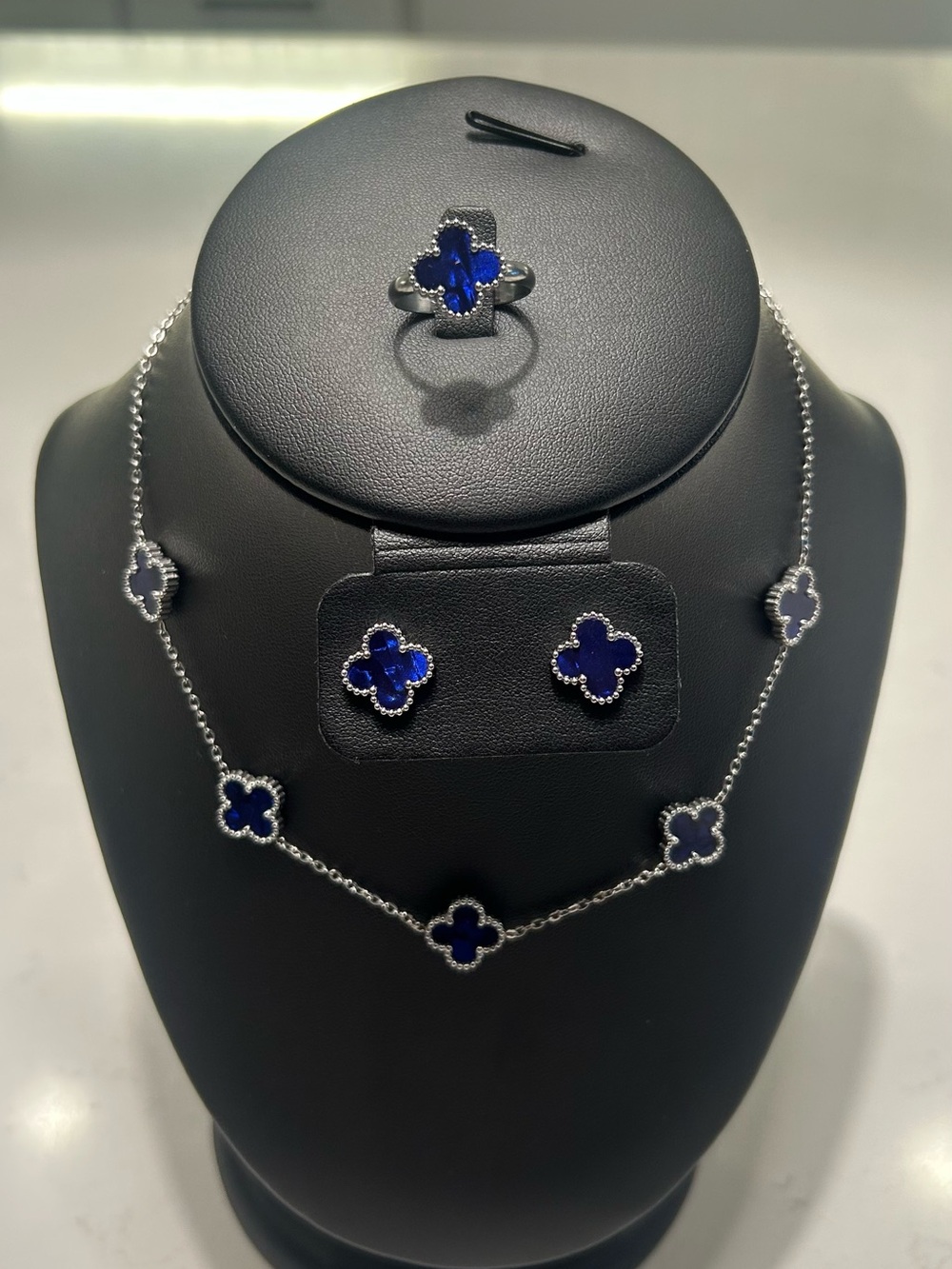 Silver Tone Blue Clover Pendant Necklace, Earrings and Ring Set